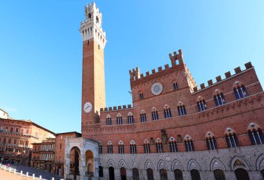 high tower called TORRE DEL MANGIA in the main square of SIENA in central Italy