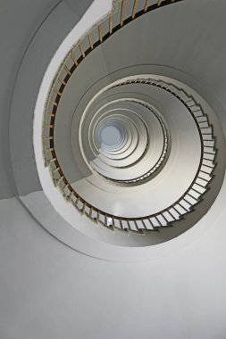 spiral staircase going up vertically without people with iron railing clipart