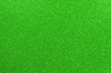 Parlak ışık ve yansımalarla parıldayan yeşil arkaplan