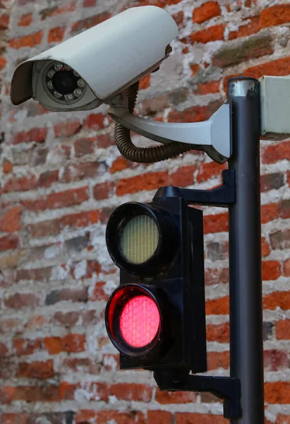 modern wifi camera with red traffic light for automatic access control in the restricted area