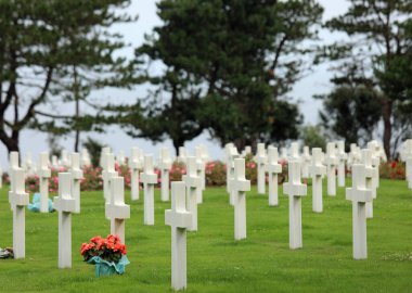 Colleville-sur-Mer, FRA, France - August 21, 2022: American Military Cemetery and many crosses on the graves of the soldiers