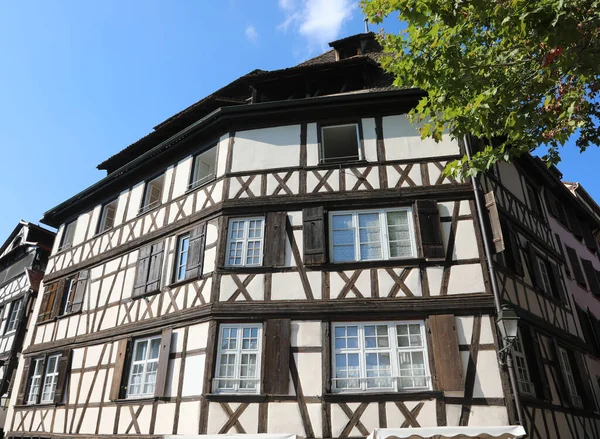 historic house with wooden balconies in the historic center of Strasbourg called Little France without people