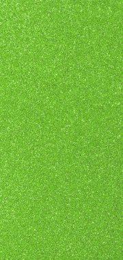 Tatillerde arkaplan olarak yeşil renkli parlayan maddenin arkaplanı ideal