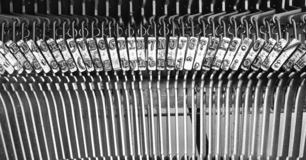 iron hammers of the antique typewriter ideal as a backdrop for book presentations