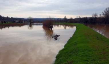 Completely flooded fields after the river overflowed due to climate change clipart