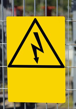 Danger high voltage risk of death sign  with lightning bolt in yellow triangle without text clipart