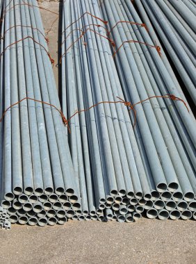 series of metal pipes for the creation of energy infrastructure to transport resources to city users clipart