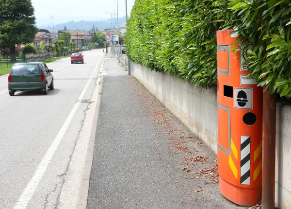 stock image roadside speed detection device called AUTOVELOX in Italian Language captures images of speeding drivers exceeding the legal limit