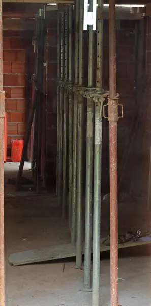 stock image construction site during the construction of a building and many props supporting the slabs without workers at work