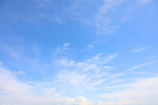 stock image Vast expanse of azure sky with fluffy white clouds symbol of purity and fresh air