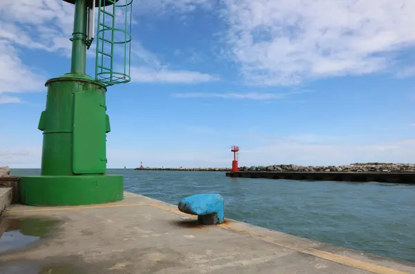 stock image navigable canal without boats and a large blue bollard where boats can be moored