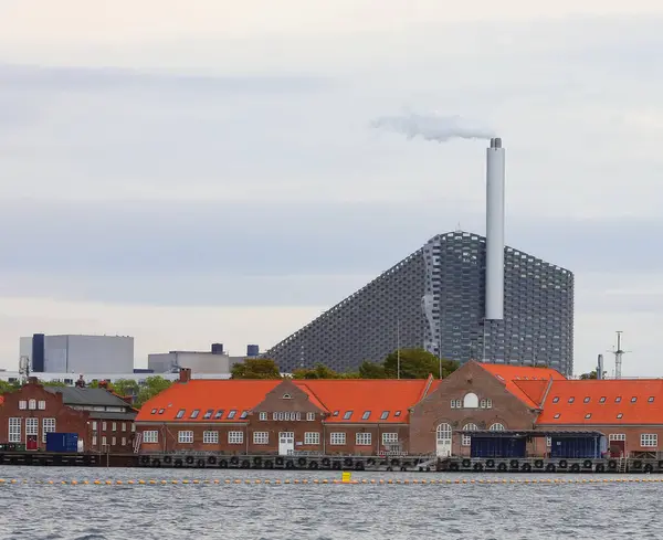 stock image Copenhagen, COP, Denmark - August 23, 2024: Amager Bakke or Copenhill is a heat and power waste-to-energy plant and recreational facility