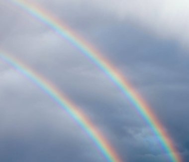 amazing rare double rainbow with many colors auspicious sign and lucky charm after storm clipart