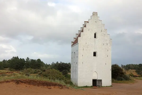 stock image Today only the bell tower remains in Northern Denmark of the church Buried by the Sand called Den Tilsandede Kirke in Danish language without people