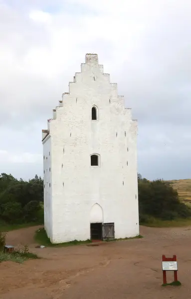 stock image Today only the bell tower remains in Northern Denmark of the Sand-Covered Church called Den Tilsandede Kirke in Danish language without people