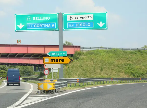 stock image road junction and signs for MARE which in Italian means SEA