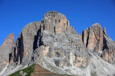 Punta Grohmann peak in the northeastern Italian Alps features the Cinque Dita mountain a legendary petrified hand of giant clipart