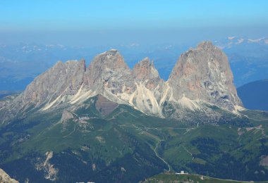 Spectacular view of the DOLOMITES mountains in the Italian Alps with the Sasso Lungo mountain group in Italy in summer clipart