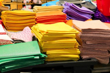 colored fabric and craft supply store for sale clipart