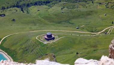 German memorial cemetery dedicated to the soldiers who fell during the First World War on Italian soil on the alpine Pass Pordoi seen from above clipart