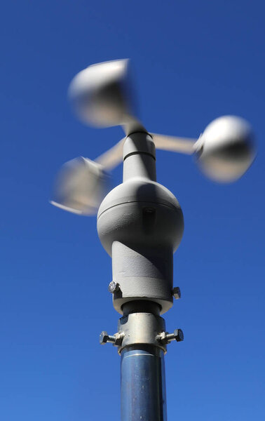 professional anemometer for measuring wind speed with three rotating metal hemispheres