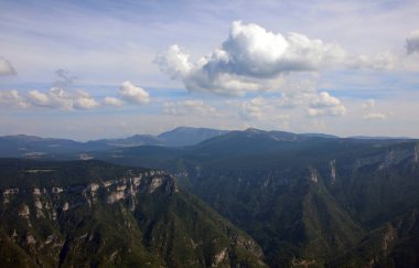 Breathtaking view of the European Alps towards the Veneto region in Northern Italy during summer clipart