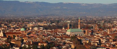 vicenza city showcasing ancient monuments and the rooftops of historic center houses clipart