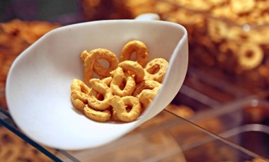 basket with many fragrant ring-shaped tarallini for sale in the italian shop clipart