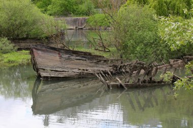 BURCIO ya da BURCHIO adlı batık eski geminin batık yayı İtalyan dilinde BURCI CEMETERY Kuzey İtalya 'da SILE nehrinin kıvrımında önerici bir yer İyilik ve tahıl taşımak için kullanılan batık ahşap tekne enkleri ile