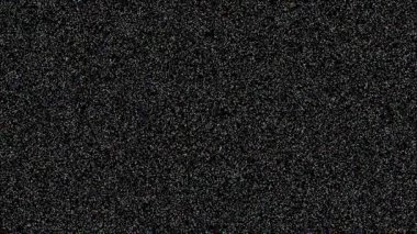 Sözcükler mutluluk mesajı ileten siyah bir arkaplan karşısında metni oluşturmak için bir araya gelen sayısız küçük noktanın oluşturduğu bir formatta görüntülenir.