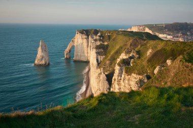 Photo of tretat Beach France at the sunset time