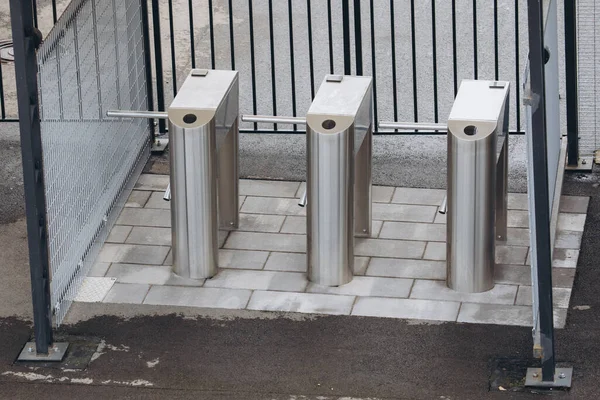 Turnstiles. Checkpoint. Automatic access control. Access system in the building. Automatic turnstile with sliding doors to control the flow of people. High quality photo