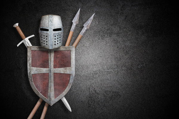  knightly shield sword helmet and two lances  on concrete black background