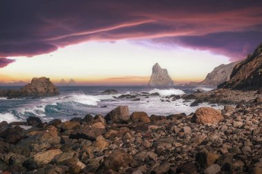 Ocean coastline with rocky formations and dramatic sky, Anaga, Tenerife, Spain clipart