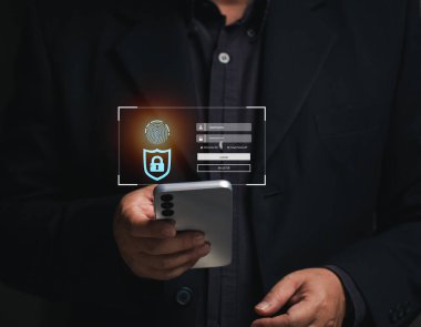Çevrimiçi kimlik doğrulama kavramı. İşadamı giriş yapmak için cep telefonu kullanarak işlemin kimliğini doğruladı. İnternet ticareti. ağ girişi. Borsa emirleri. Eğitim.