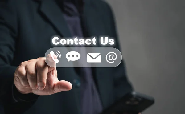 contact us or Customer support hotline service. Businessmen use mobile phones to find company contact information from the internet, addresses, online mail, chat inquiries, telephone numbers.