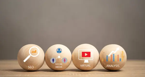 Digital Marketing icons on wooden balls set on table. online marketing Using technology to help with marketing. SEO. social media. data analysis. Making viral clips. Business. Finance.
