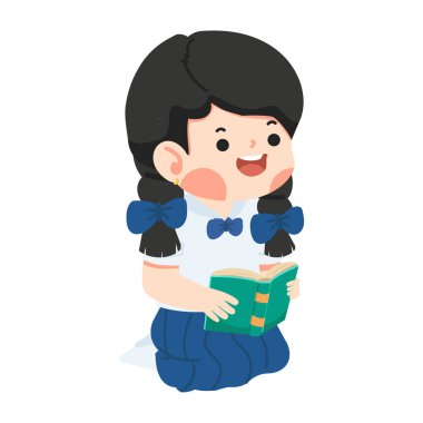 Yerde kitap okuyan bir çocuk.