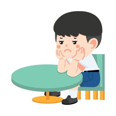 Çocuk eli çenesinde bir masada oturuyor.