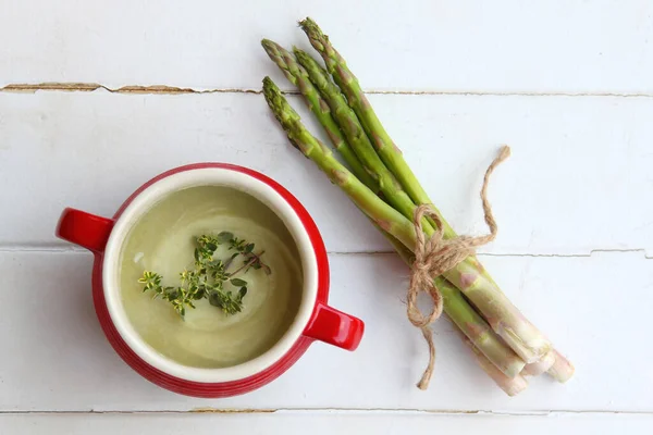 Asparagus Soup Red Bowl Fresh Vegetables Side White Background Royalty Free Stock Images