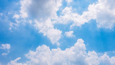 Panoramic view of clear blue sky and clouds, Blue sky background with tiny clouds. White fluffy clouds in the blue sky.