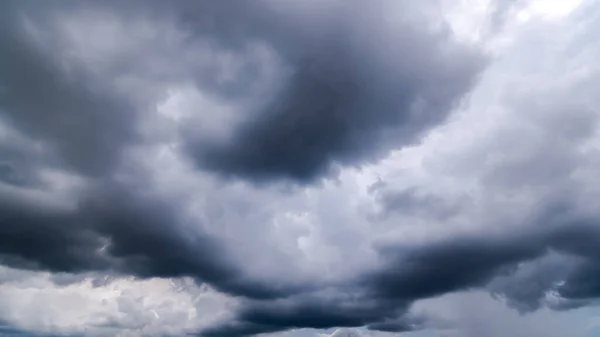 stock image  Dark sky with stormy clouds. Dramatic sky ,Dark clouds before a thunder-storm.