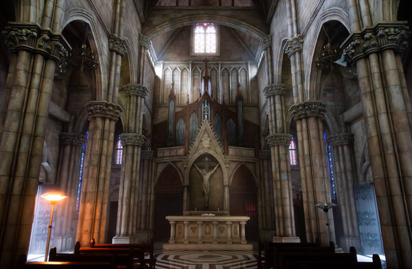 People praying in church benches