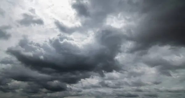 stock image Dark sky with stormy clouds. Dramatic sky rain,Dark clouds before a thunder-storm.