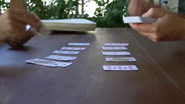 Two People Playing Matching Game Cards Players Try Use All — Stock Video