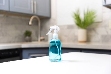 Cleaning  spray in a kitchen