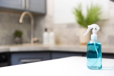 Cleaning  spray in a kitchen