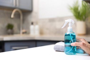 Cleaning  spray in a kitchen