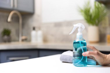 Cleaning  spray in a kitchen