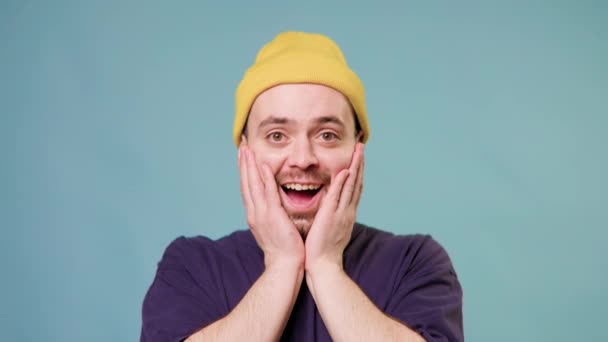 European Amazed Hipster Guy Pleasantly Surprised Camera Blue Background Wow — Stock video